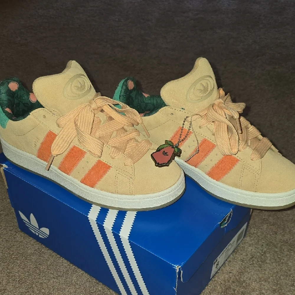adidas Suede Low-Top Sneakers in Peach with Orange Stripes